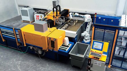 Production cell with wate jet cutting system and robot manipulator